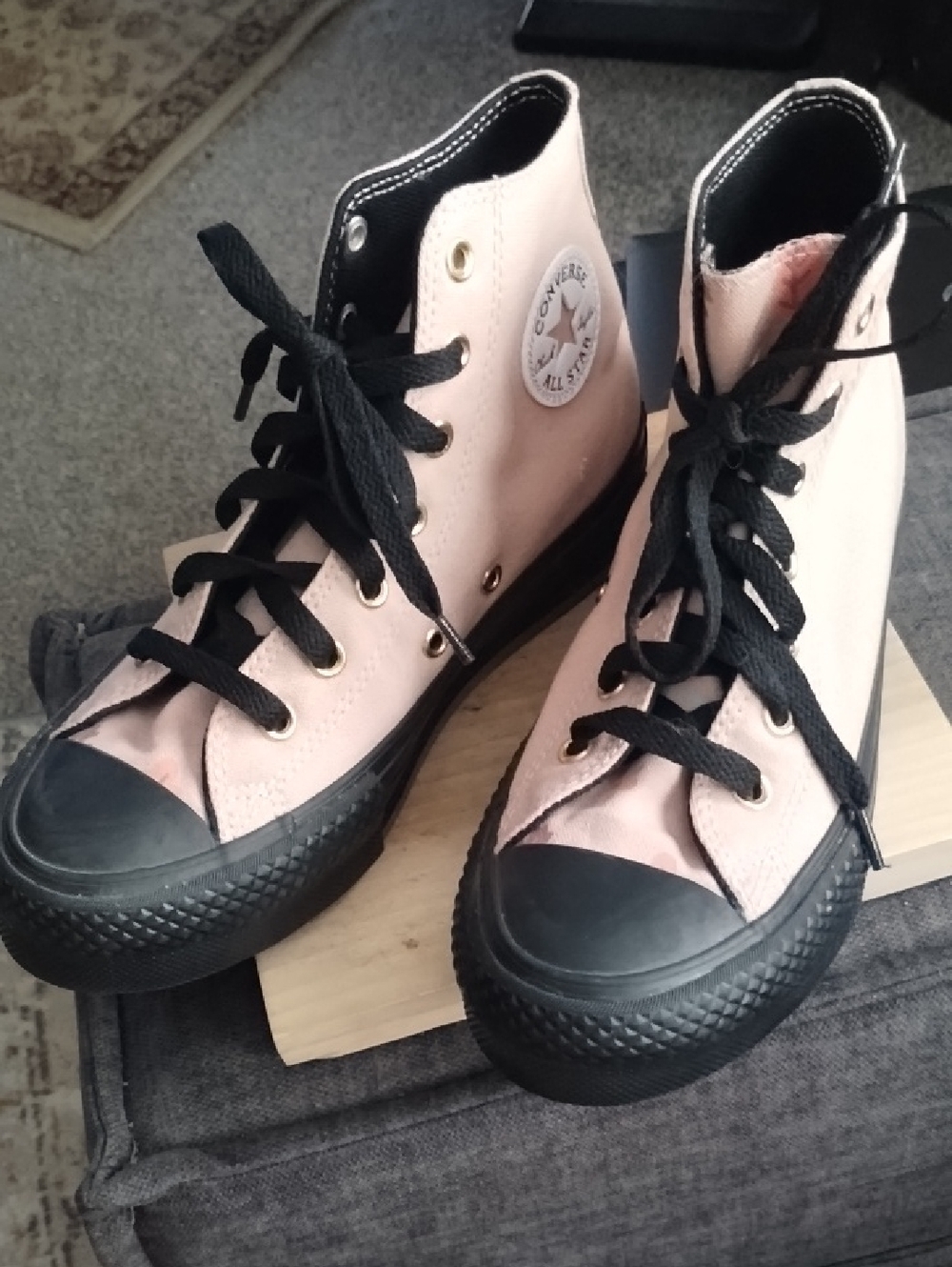 Converse Pink High-Top Sneakers with Black Soles and Laces